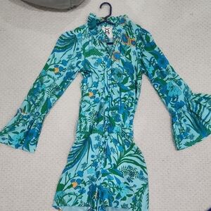 Figue long sleeve, coverrd buttons, ruffle neck, ruffle sleeve romper